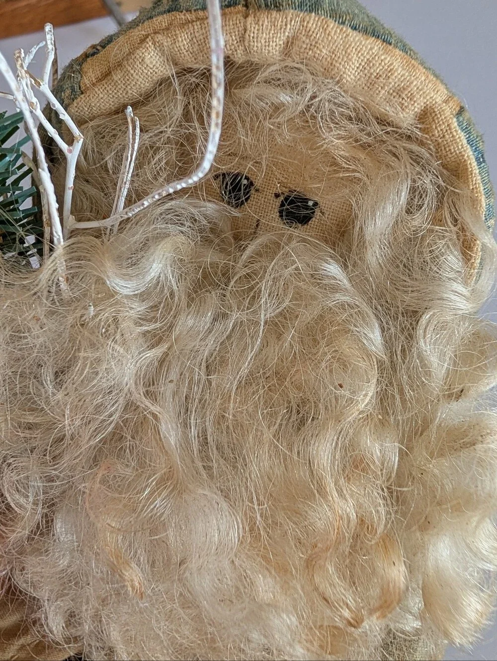 FOLK ART SANTA CLAUS wearing an antique quilt